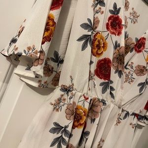 Floral top with cinched waist. Worn once.